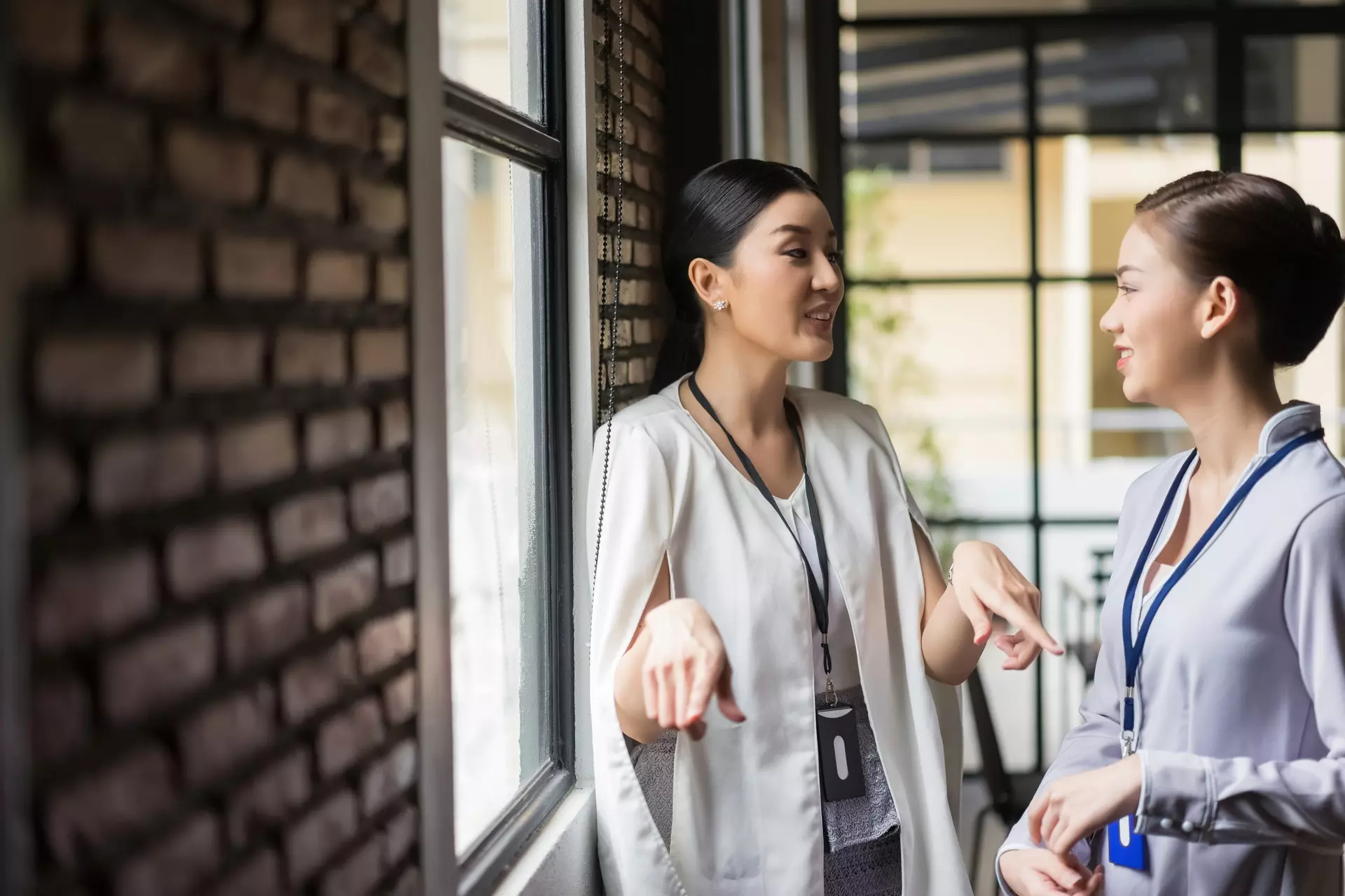 Employees communicating with each other in the office
