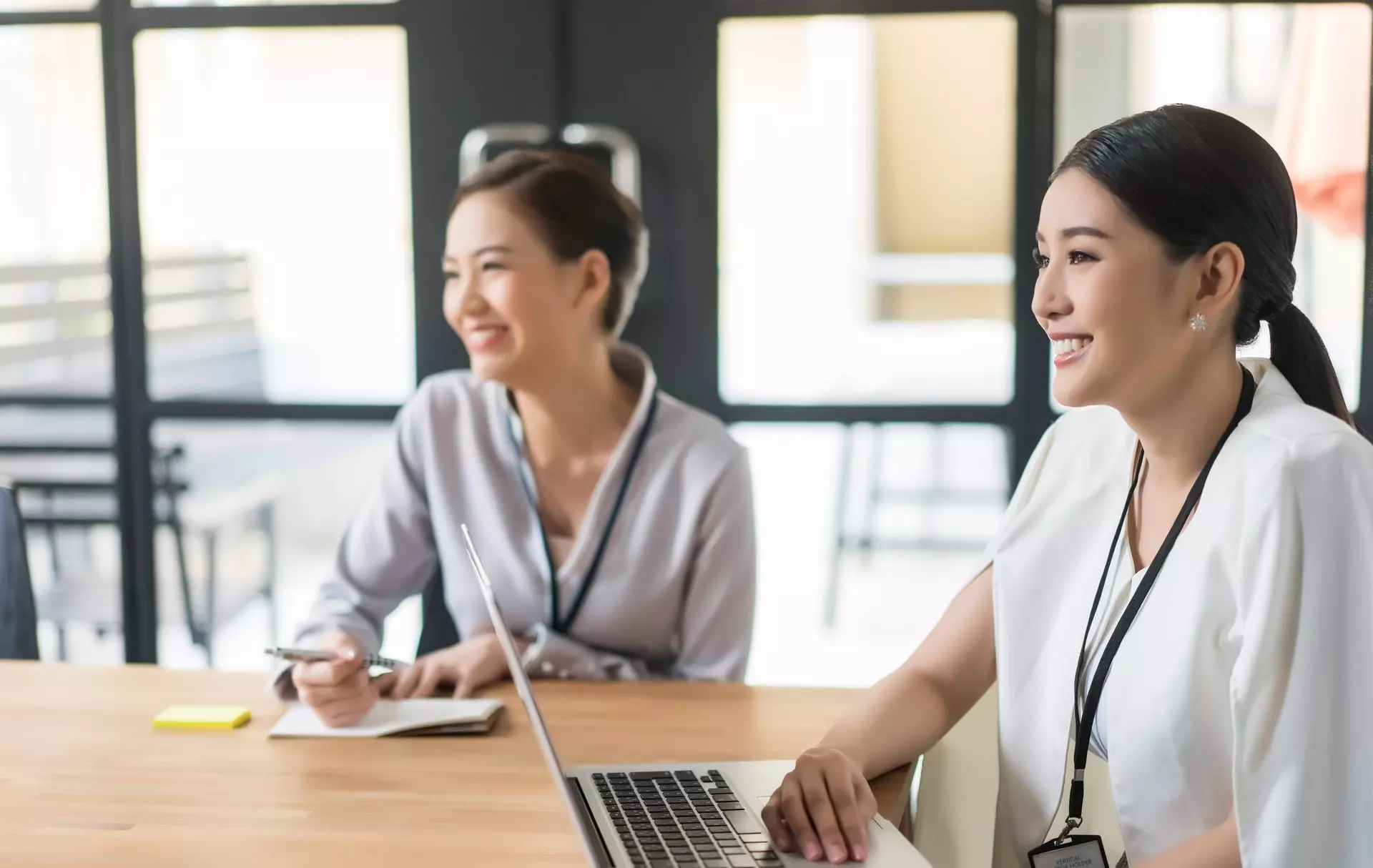 Happy employees working in the office