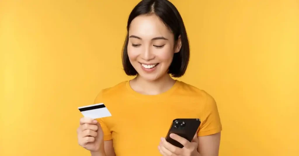 Girl-Holding-HP-Credit-Card